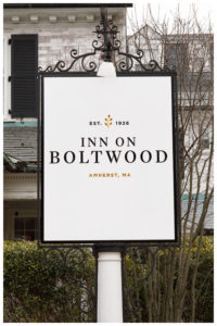 Sign of the Inn on Boltwood out front of the Inn