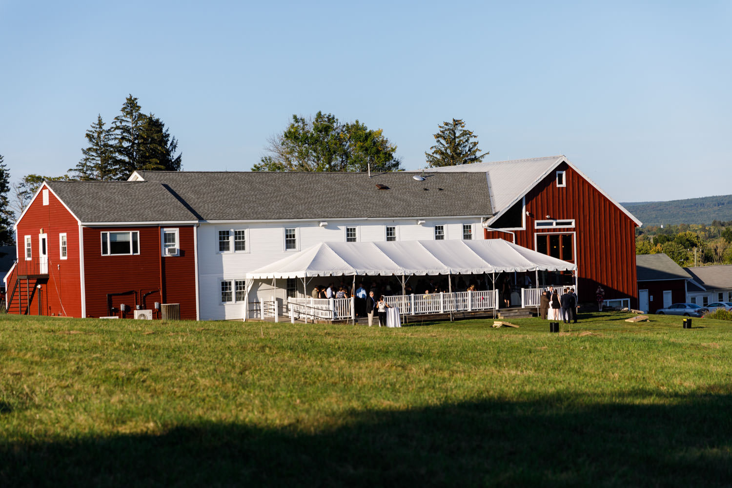 Outside photo of the Red Barn and patio space