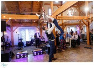 Groomsmen introduction doing classic lift from dirty dancing