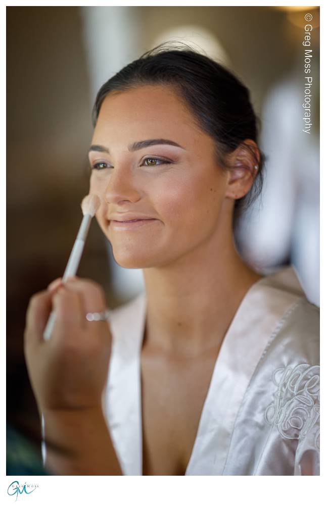 Bridesmaid getting makeup applied