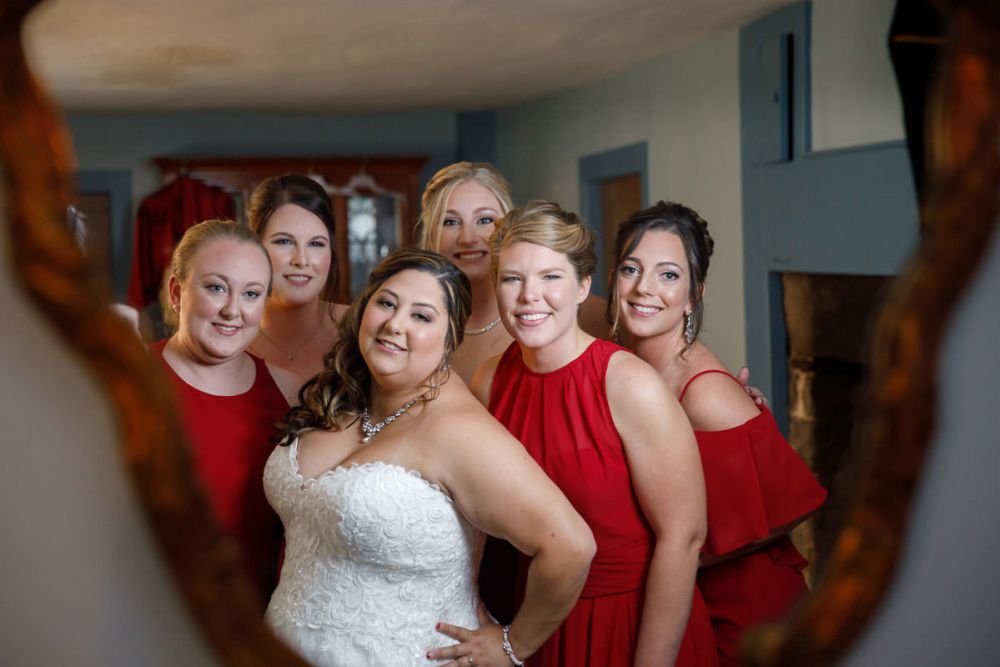 Bride and bridesmaids in mirror