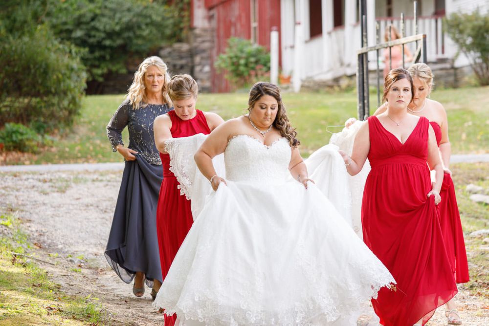 Bride with Bridesmaids carrying train