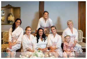 Bridal party in matching robes before ceremony