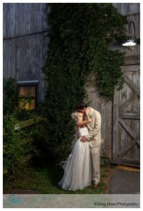 photo in front of barn at Plimouth Museum wedding