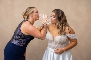 Bride and Matron of honor toasting with chapagne