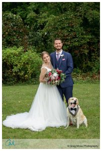 Wedding couple with their dog