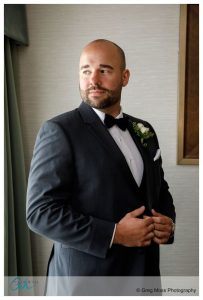 Groom window portrait at the D Hotel in Holyoke