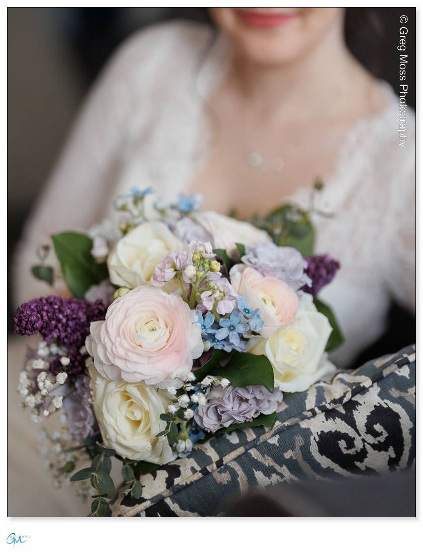 Wedding bouquet with purple, pink and white flowers