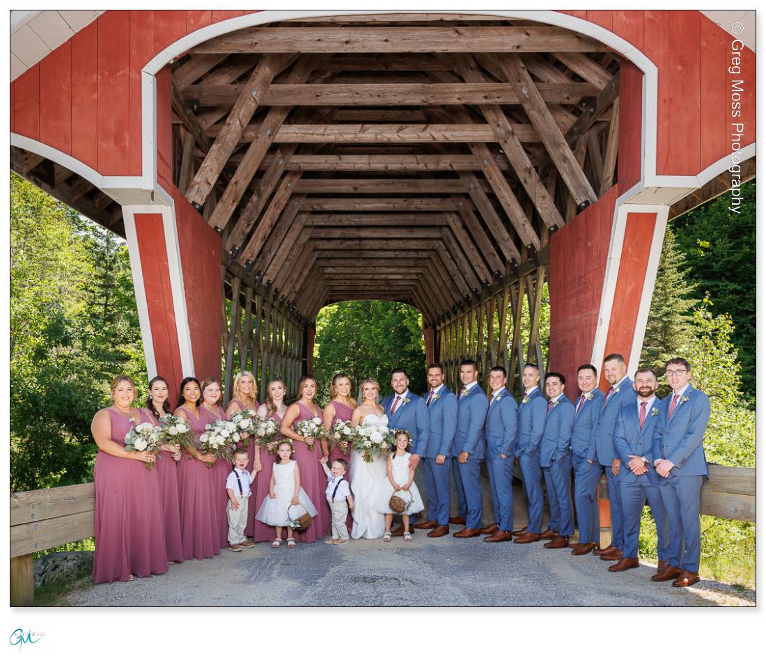 Wedding Party in front of covered bridge at Stratton Mountain