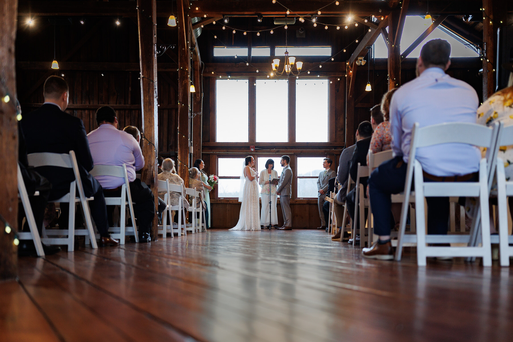 Indoor wedding ceremony at the Red barn