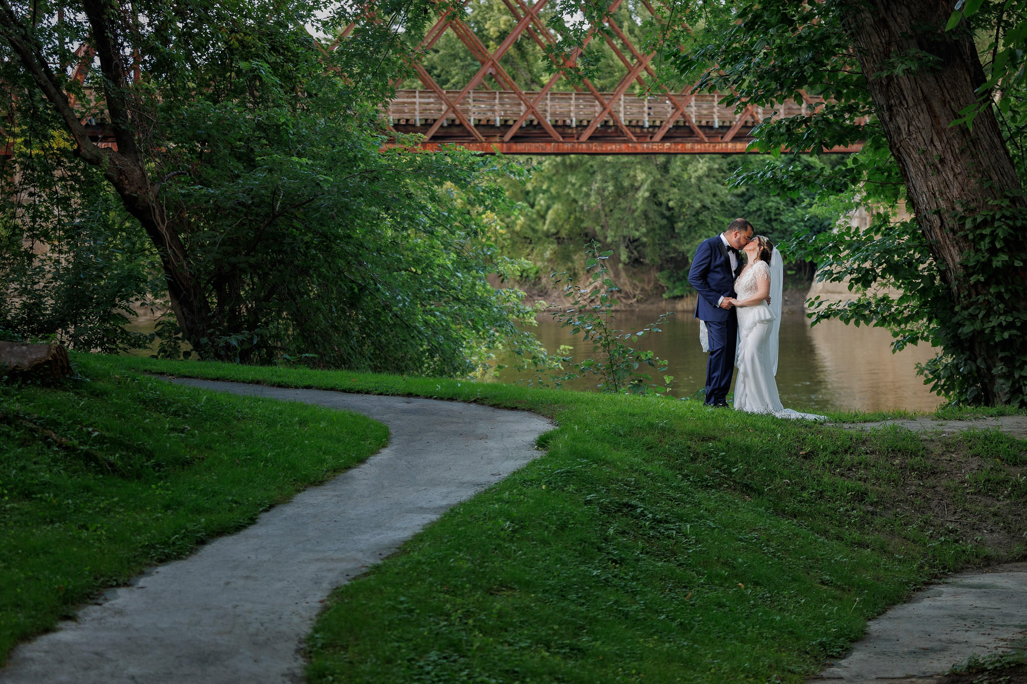 Wedding couple creative portrait in Northampton by the Ct. river.
